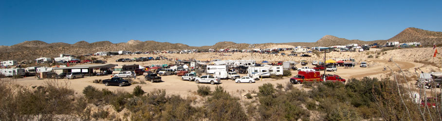 Hills covered with campsites.