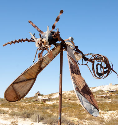 Metal insect sculpture.